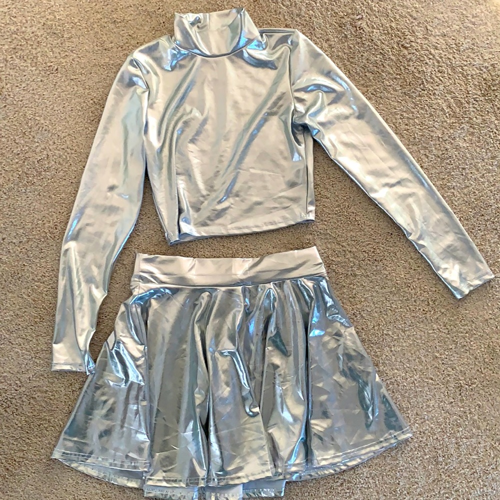 Silver crop top and skirt. Worn once. Already washed. Bought from Amazon.